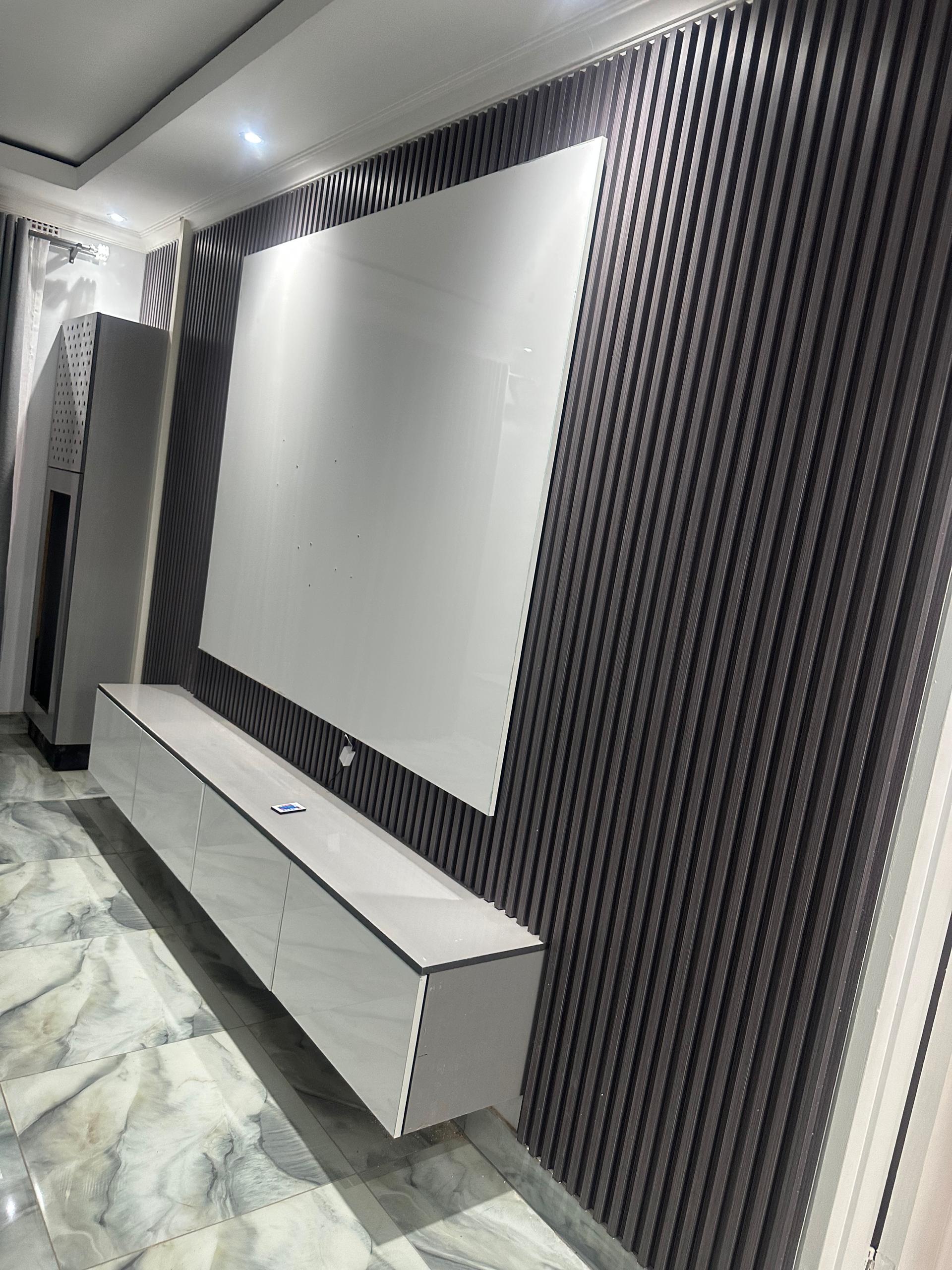 Floating Tv units with cladded walls